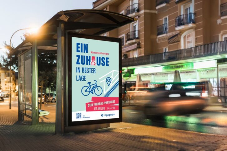 Leuchttafel mit einem beleuchteten Plakat - Text: Ein Zuhause in bester lage